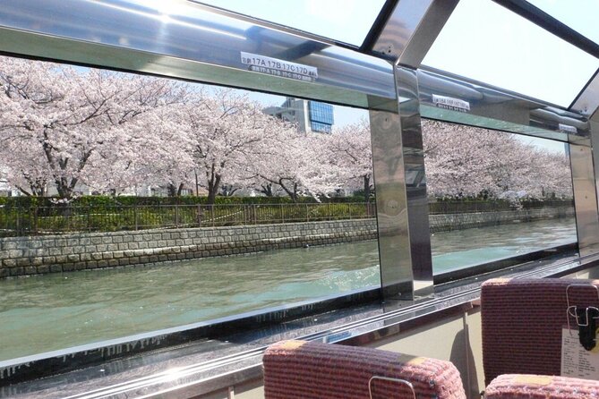 1 Day Takoyaki Making and Osaka Castle Walking Tour - Shinsekai and Tsutenkaku: snack streets and late-20th-century energy