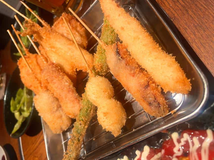 3.5h Osaka Night guided Local Bar Hopping, Sake & Karaoke - Hozenji Temple prayer: a short culture break in the middle of the night