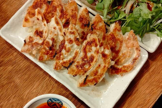 Hidden Osaka Foodie Tour: Nishinari Backstreets & Local Dining - Retro Backstreets and Street Art, the Meaning Behind the Color