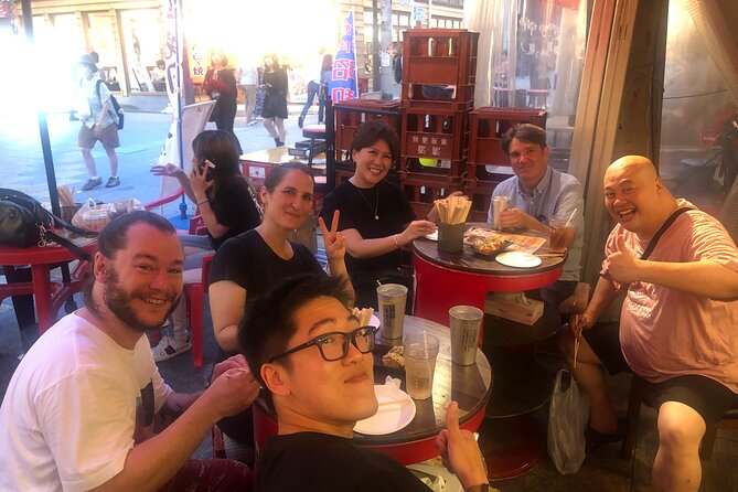 Hungry Osaka Street Food Tour:15 Tastings & 3 Drinks with a Local - Shinsekai at night: the Osaka street-food zone that still feels local