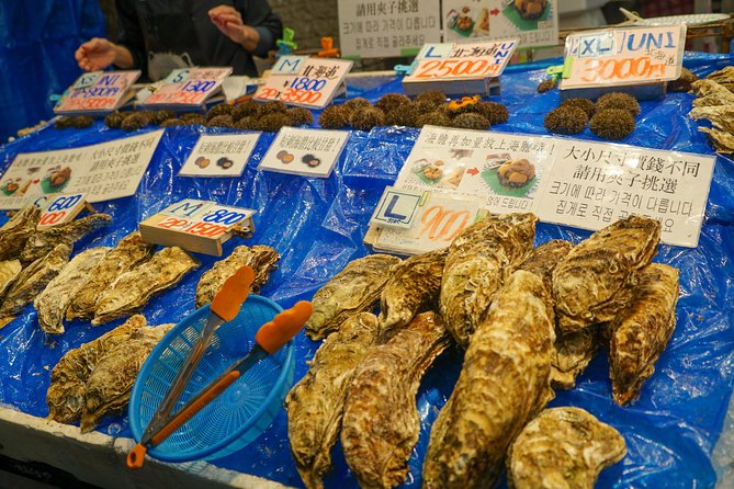 Kuromon Market Food Walking Tour in Osaka (6 stops, 6 tastes) - Doguyasuji street: buy things that make sense after you eat