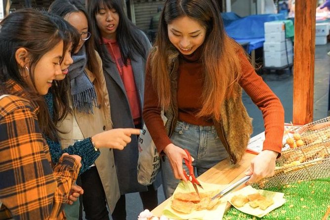 Kuromon Market Food Walking Tour in Osaka (6 stops, 6 tastes) - Dotonbori pass-through: neon sights, but with help to keep it smart