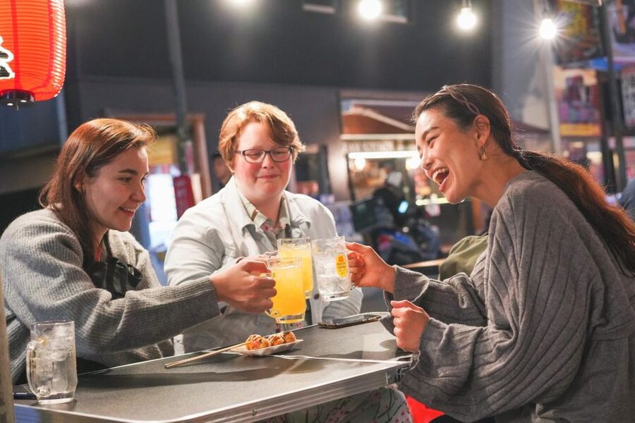 Osaka: Bar-Hopping Night Tour in Namba - The first izakaya alley stop near Dotonbori: kushikatsu, beer, and friendly pressure-free ordering