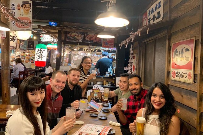 Osaka Bar Hopping Night Walking Tour in Namba (3 bars, 6 tastes) - First Stops: The Glico Billboard Moment and Shinsaibashi-suji