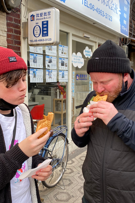 Osaka Castle Walking Tour – With Optional City Highlights - Street-food guidance, chopsticks practice, and a kendama break
