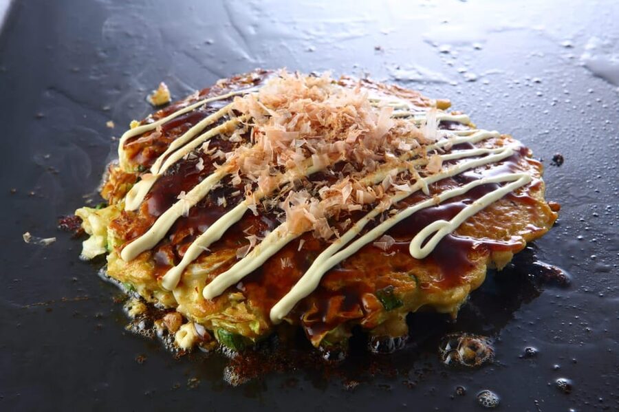 Osaka: Cooking Class & Sake Tasting with Local Market Visit - Cooking niku-sui, okonomiyaki, and gyoza step by step