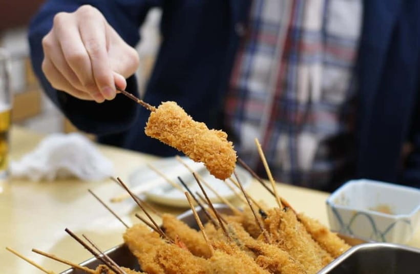 Osaka: Food Tour Kuromon Market & Dotonbori with Guide - Getting Oriented: Meet Outside Hotel Royal Classic Osaka