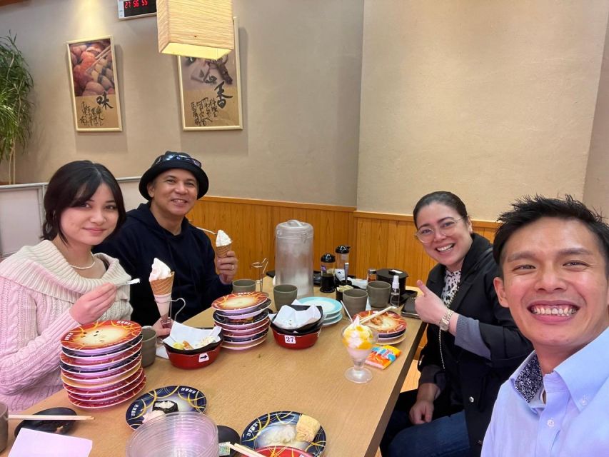 Osaka: Full-Day City Tour with a Guide and Public Transport - Osaka Castle Park and castle entrance: where the old city energy lives