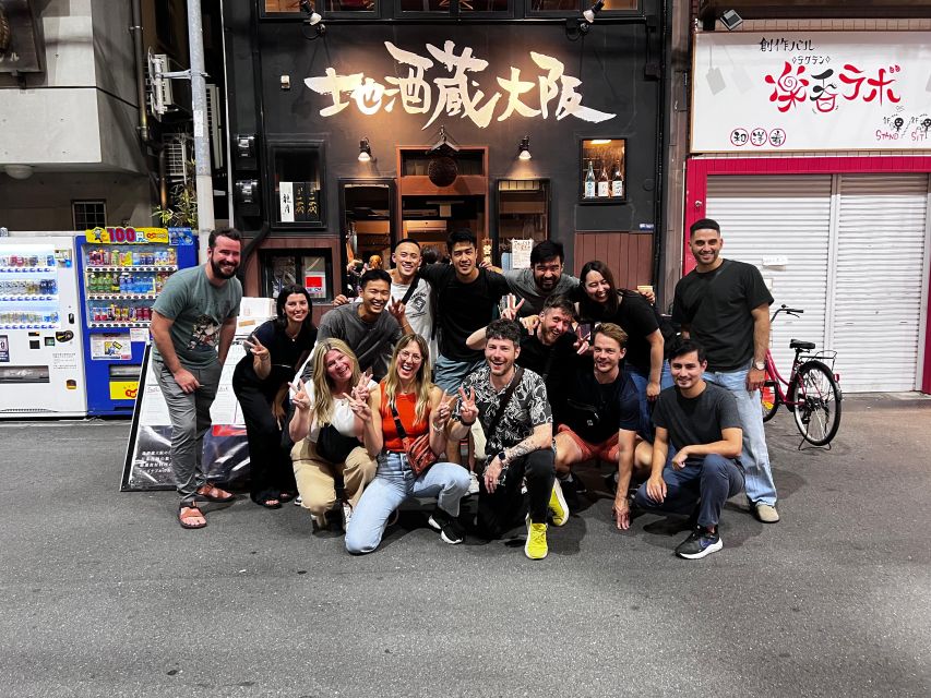 Osaka: Izakaya Bars Guided Walking Tour - Dotonbori’s short intro: neon streets plus cultural cues