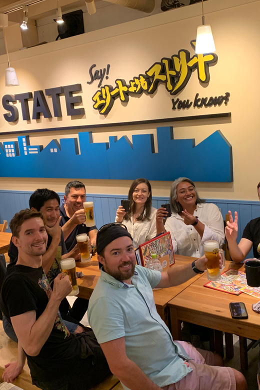 Osaka: Namba Pub Bar Crawl with a Local Guide - Stop One in Namba: your first izakaya bite and drink setup