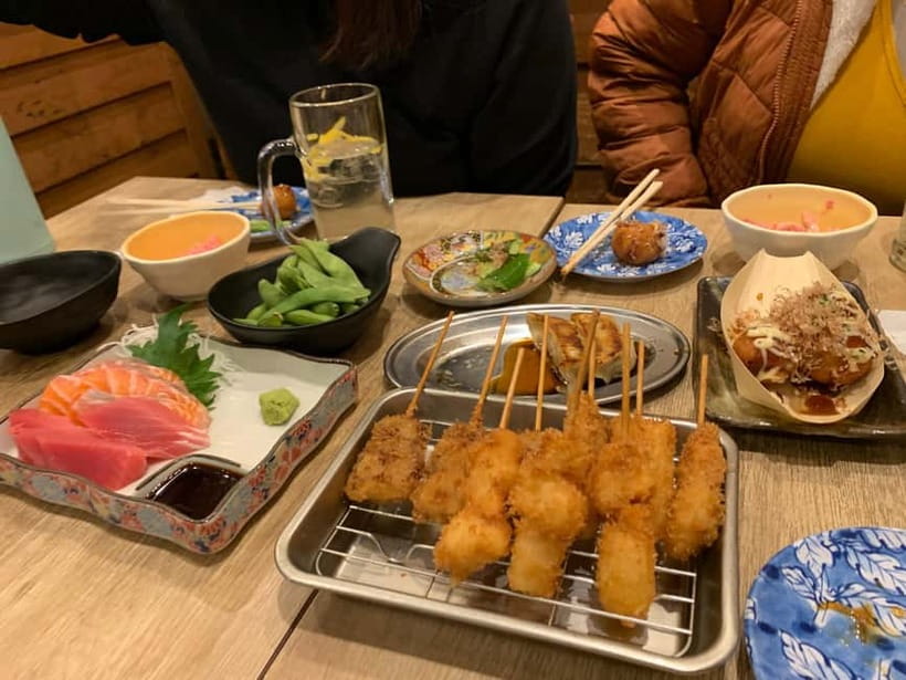 Osaka: Namba Pub Bar Crawl with a Local Guide - Stop Three in American Village: whiskey tasting and a rooftop-style finale