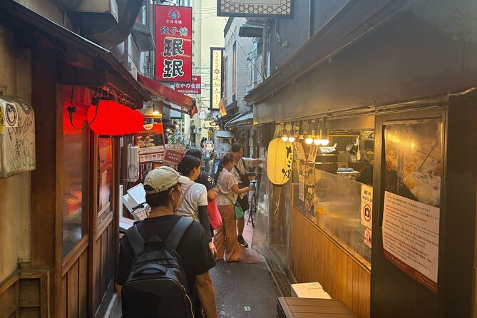 Osaka Night Walk : Discover Umeda Food and Pub - Stop 1 Ohatsu Tenjin Food Street, Where Standing Around Is Part of the Fun