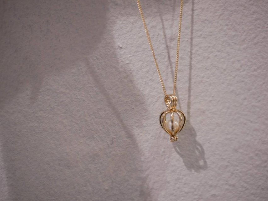 Osaka Shinsaibashi Pearl extraction experience - The Pearl Reveal: Natural Akoya Charm and the No-Exchange Rule