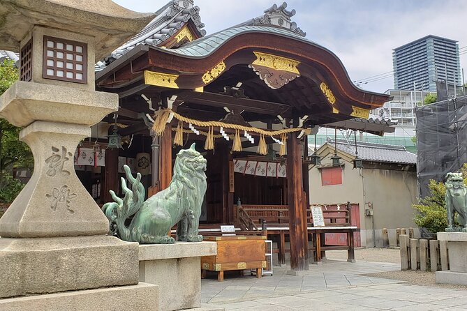 Tour and Food Tour in Osaka with Goverment Guide All incluided - Tsutenkaku and Shitennoji: street-life energy meets quiet temple calm